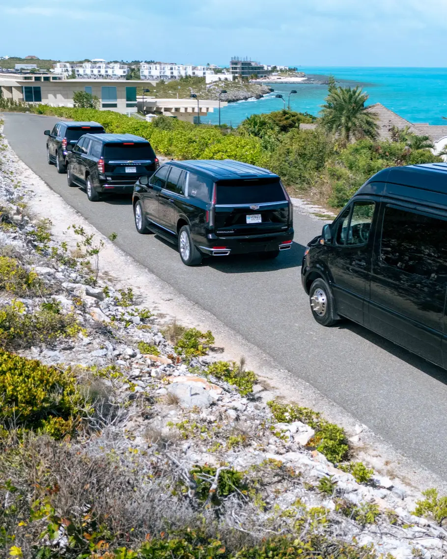 MR VIP luxury vehicles beside the turquoise waters of Turtle Tail, Providenciales