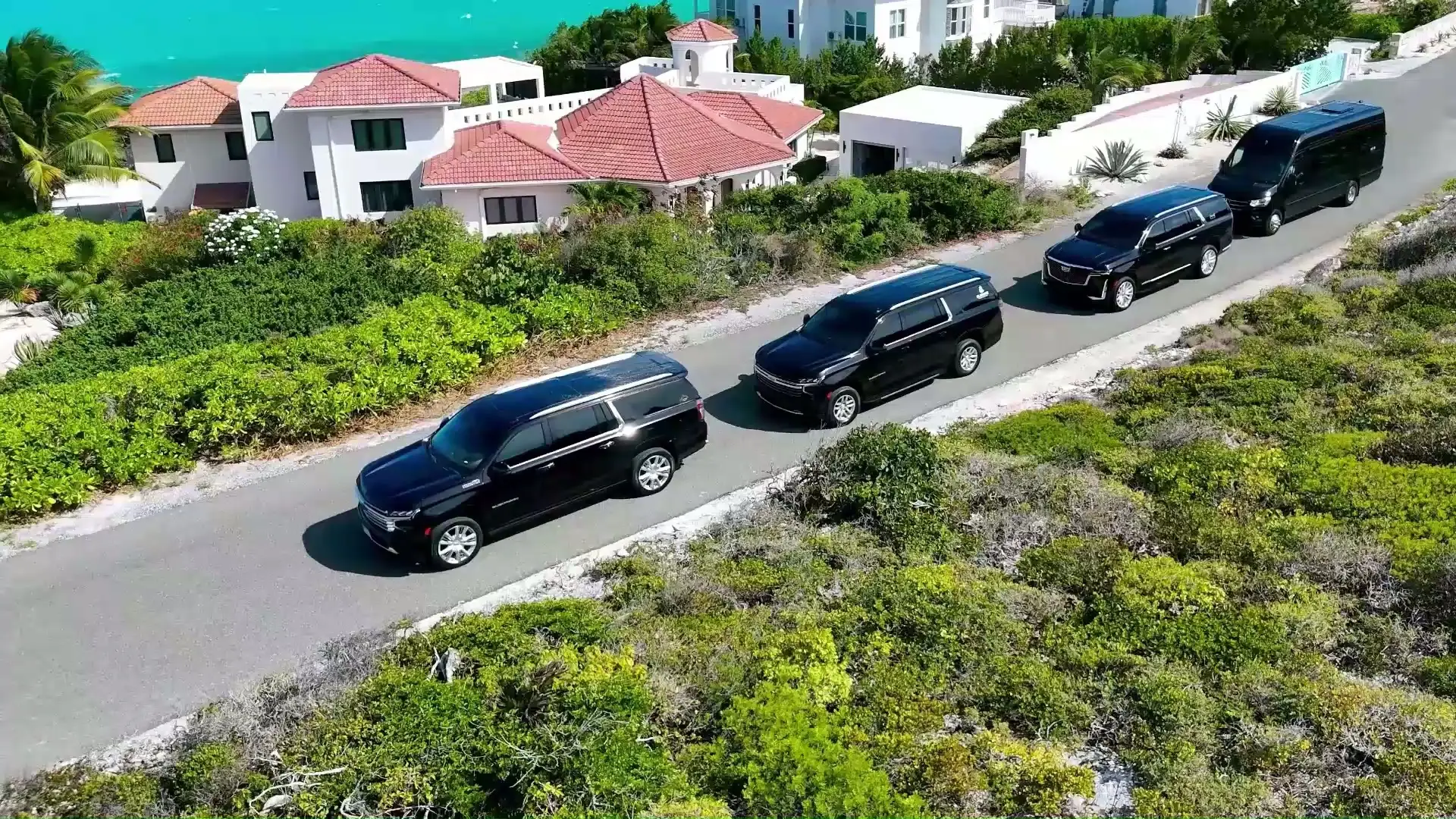 MR VIP vehicles travelling between island villas near the ocean